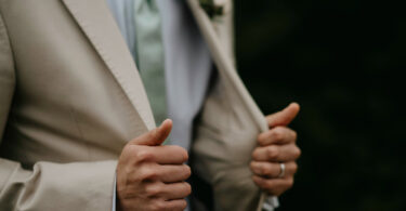 wearing a beige suit for your wedding